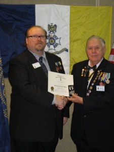 Shawn Stoner is awarded the Meritorious Service Medal