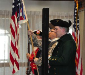Presenting the colors for the assembled to say the Pledge of Alligence.